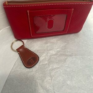 Red Leather ID Wallet with Key ring
Pebble leather 
7.5”L X 4”H